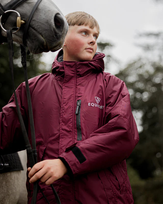 Man in EQUIDRY Evolution Waterproof Plum Coat with Horse | Equiflair - Fleece Lined Rider Jacket - XS
