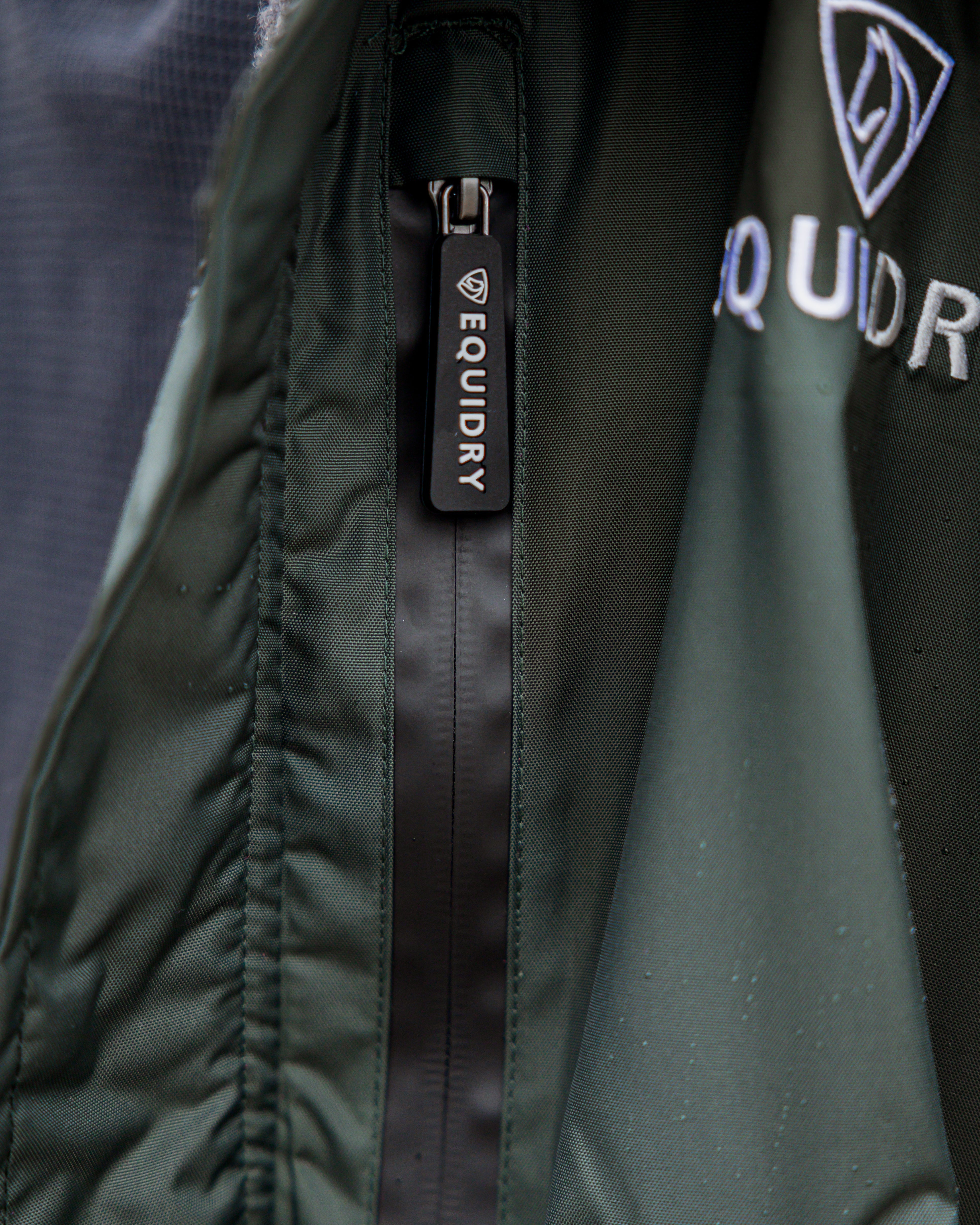EQUIDRY Evolution Black Forest Green Jacket: Zipper Detail with Logo, Equestrian Waterproof Coat by Equiflair