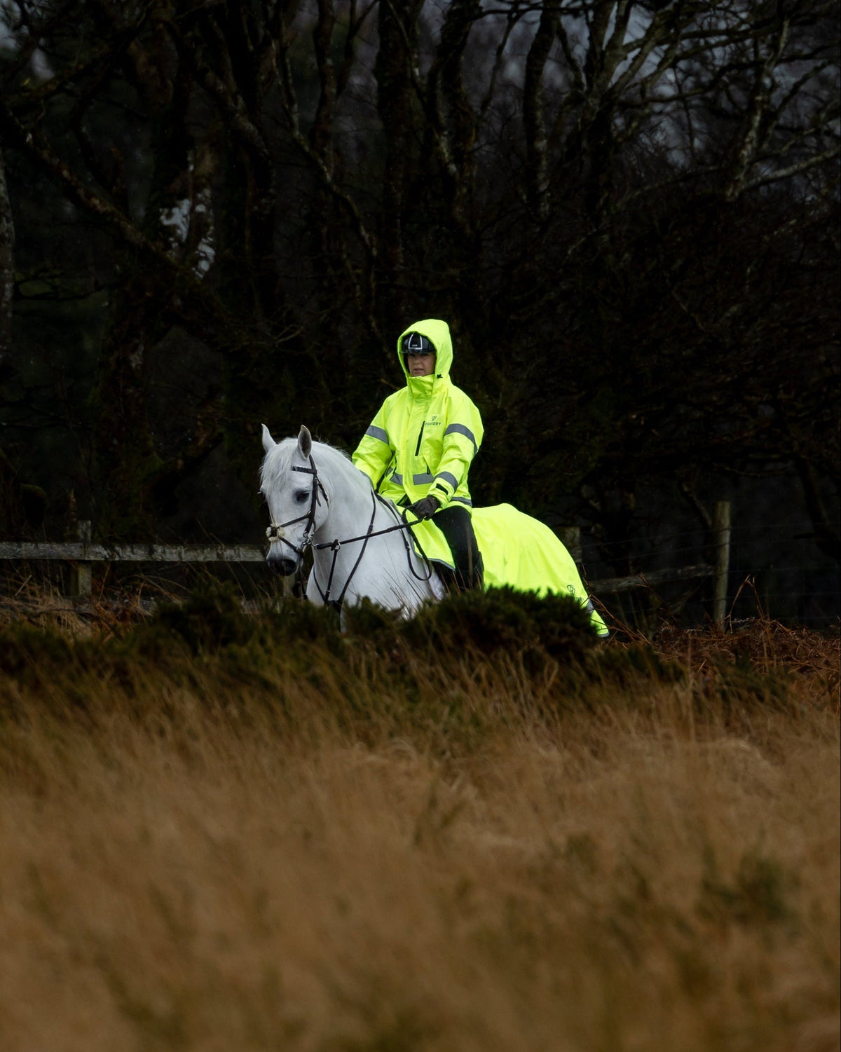 Equidry women's hi-vis yellow riding coat with reflective trims and fleece lining
