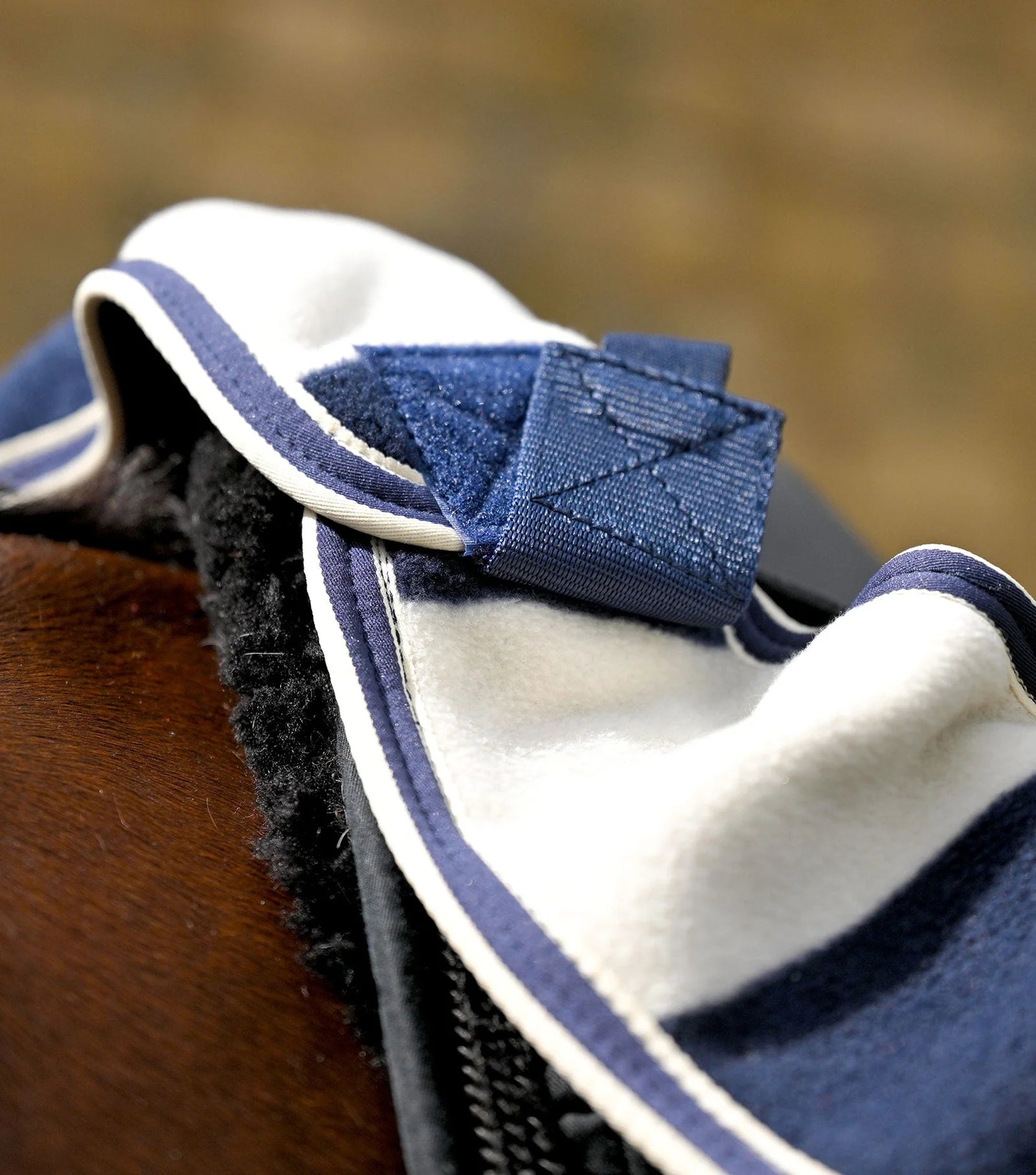Premier Equine Horse Fleece Exercise Rug Navy/White | Equiflair. Secure fit fleece exercise blanket on horse's back.