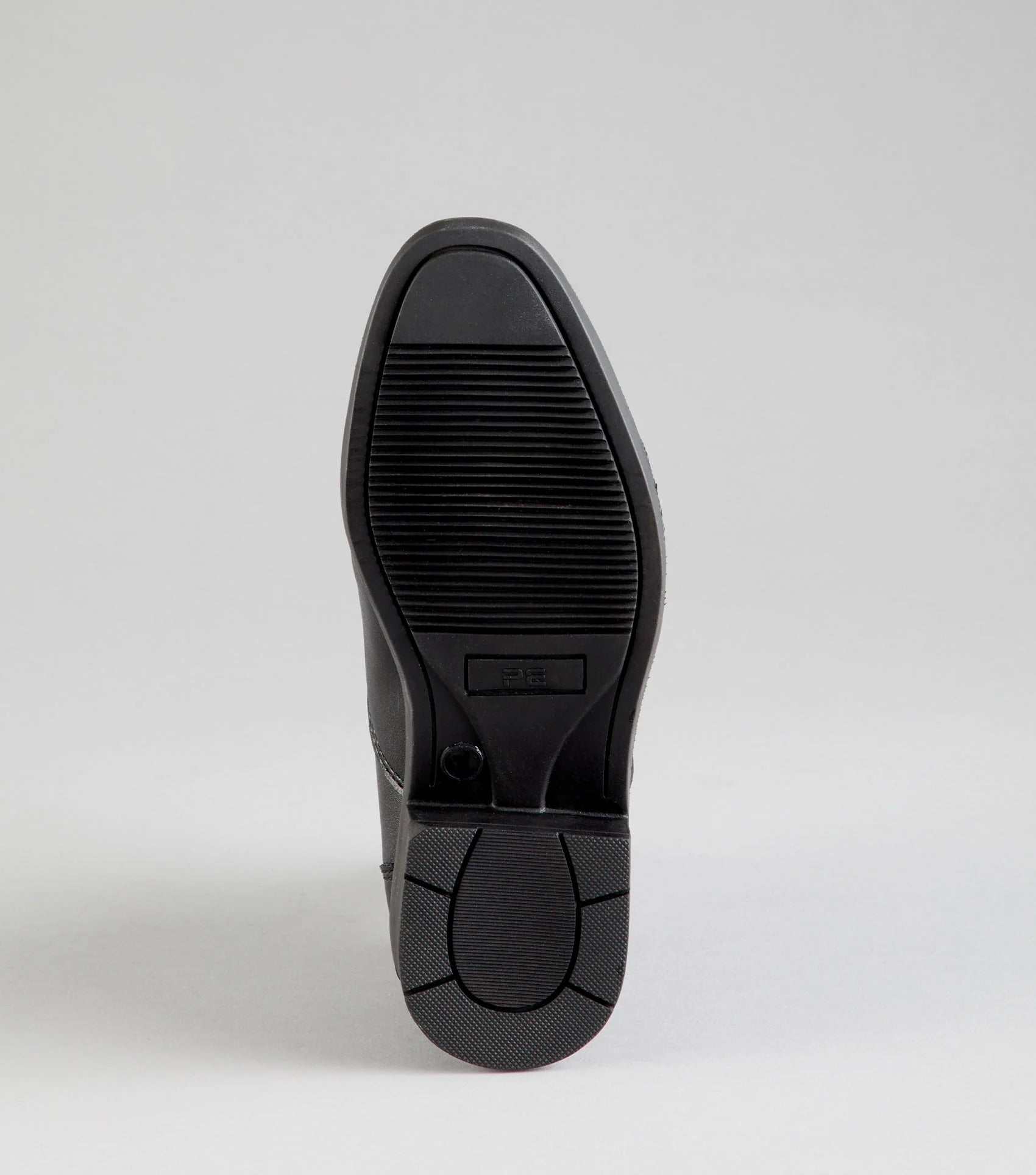 Black Paddock Boot Sole: Anti-Slip, Molded, Equestrian, Junior Riding Boot. PE Branding Visible.