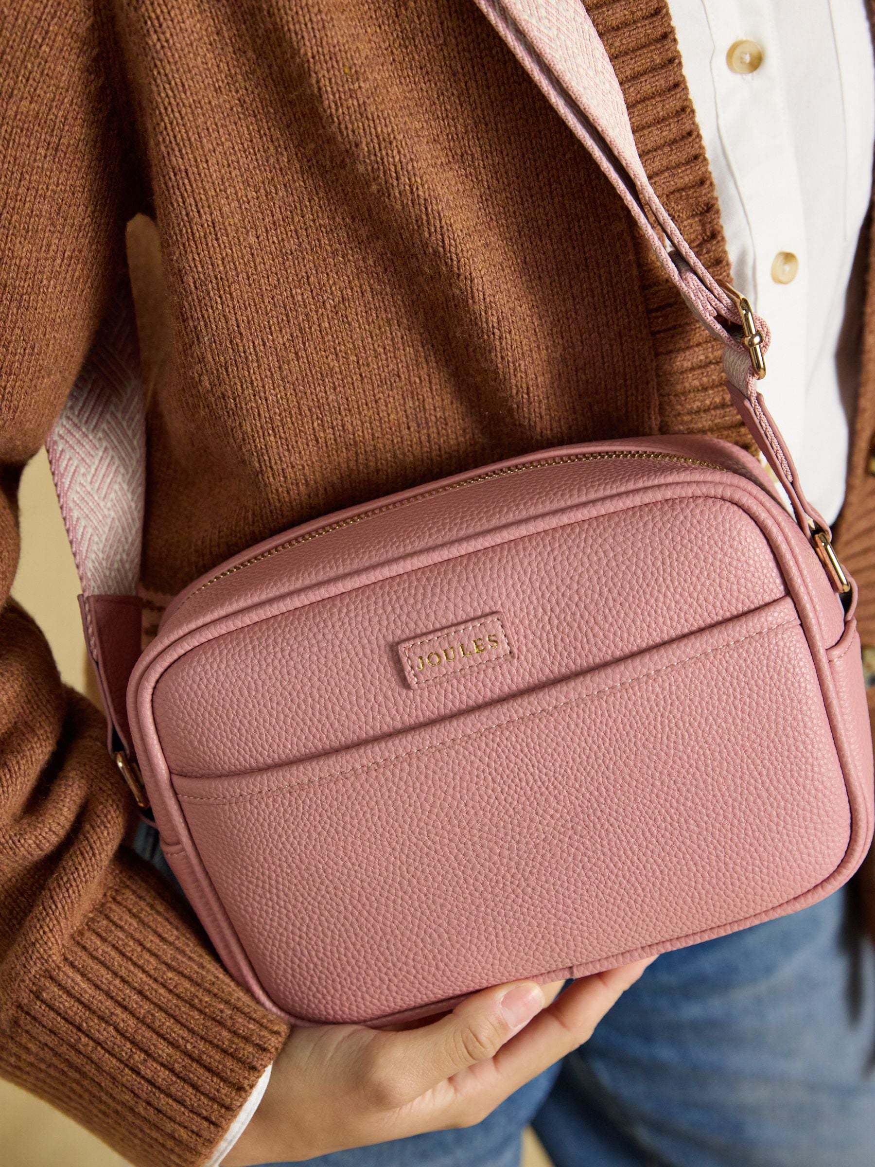 Joules Trent Cross Body Bag in pink faux leather for women, featuring adjustable strap.