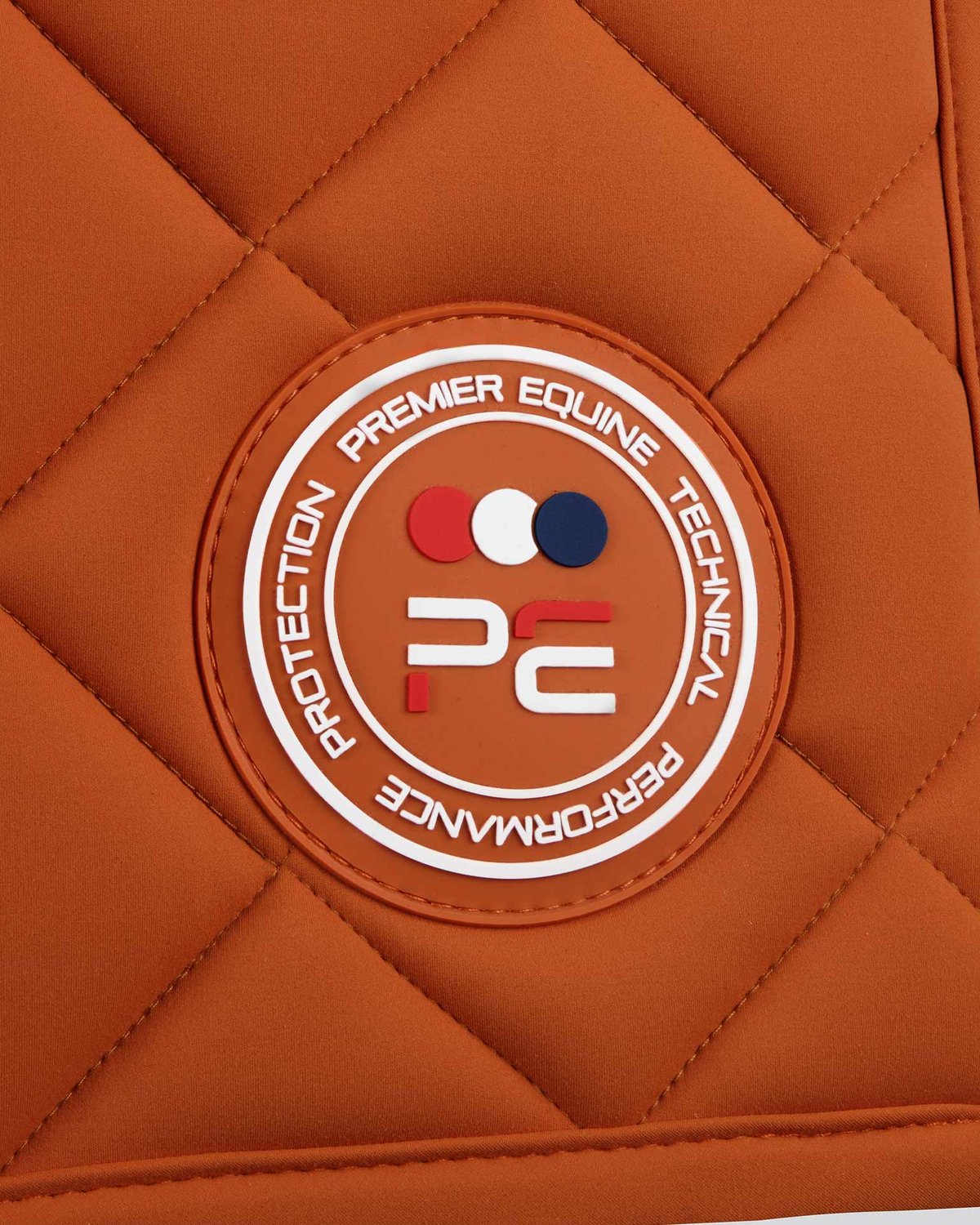 PREMIER EQUINE Atlas Close Contact Dressage Square - Burnt Orange Saddle Pad. Quilted dressage pad for optimal performance.