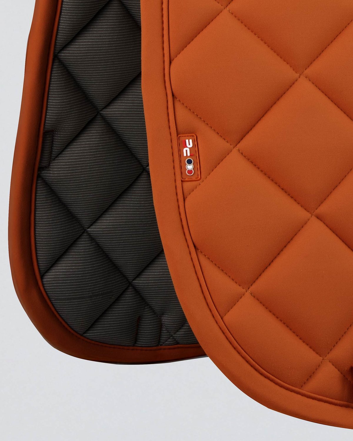 PREMIER EQUINE Atlas Close Contact Dressage Saddle Pad - Burnt Orange Quilted Design