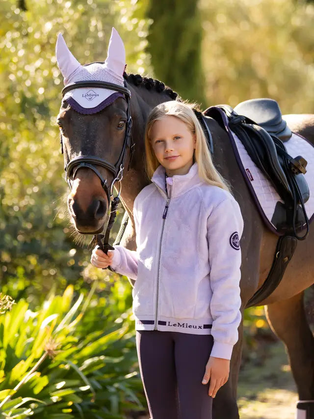 LeMieux Young Rider Libby Fleece Lilac: Cozy equestrian apparel for young riders. Featuring soft fleece & stylish LeMieux…