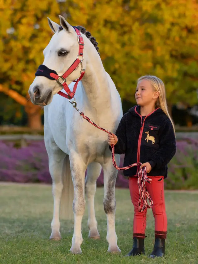 Girl with White Horse wearing Lemieux Equestrian Apparel - Equiflair