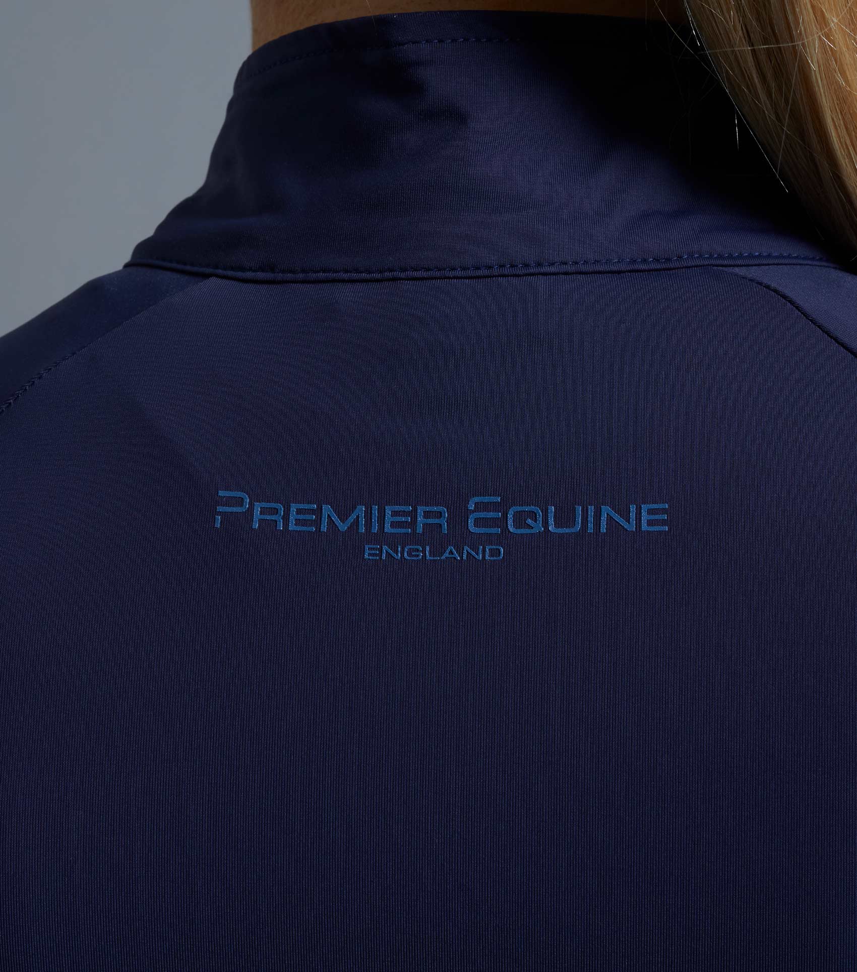Premier Equine Aura Ladies Navy Riding Top. England equestrian apparel, performance wear, short sleeve.