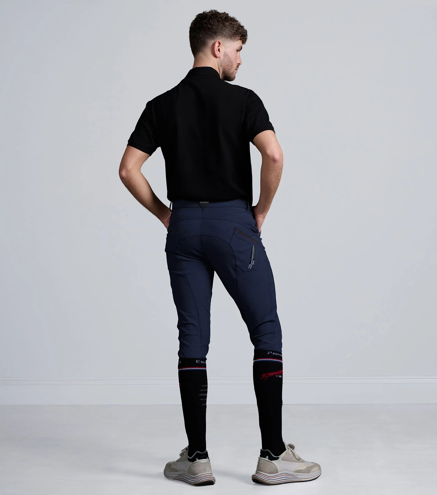 Premier Equine Barusso Men's Gel Knee Riding Breeches Navy: Comfortable and secure equestrian apparel for every day use.
