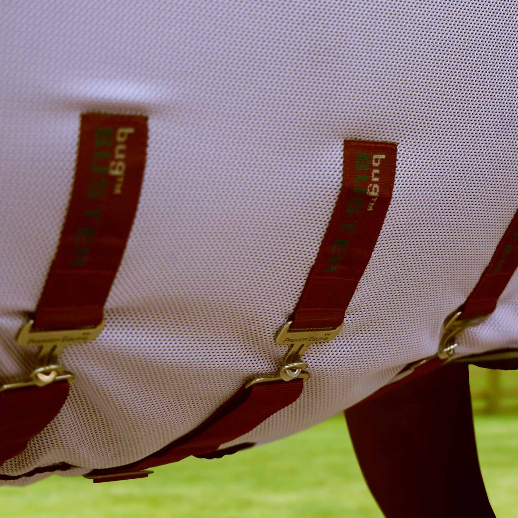 Premier Equine Bug Buster Fly Rug: Lavender mesh, burgundy straps with "Bug Buster" branding, horse fly protection