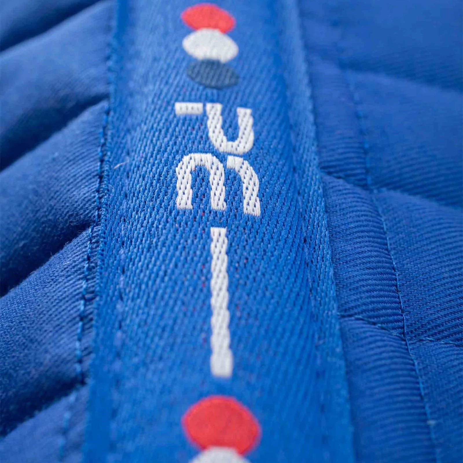 Premier Equine Royal Blue Cross Country Saddle Pad Close-up - High Quality Cotton, Close Contact Saddle Pad