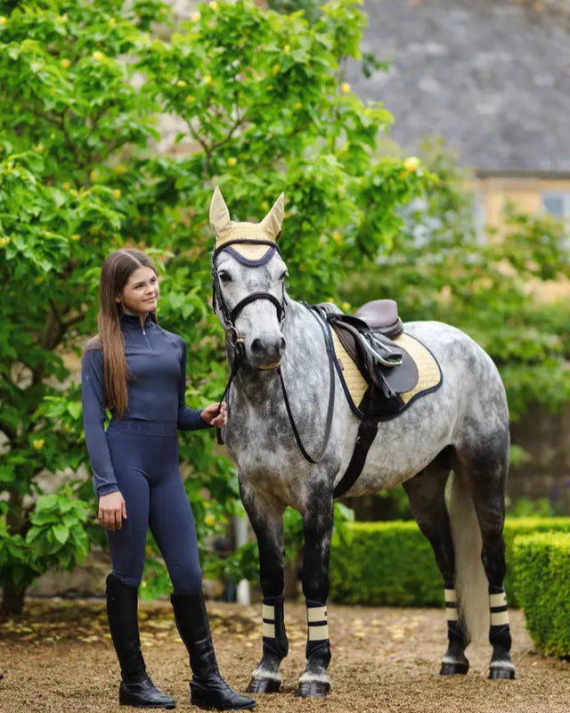Girl and Horse in Lemieux Apparel: Equestrian Style | Young Rider Base Layer - Dusk Blue