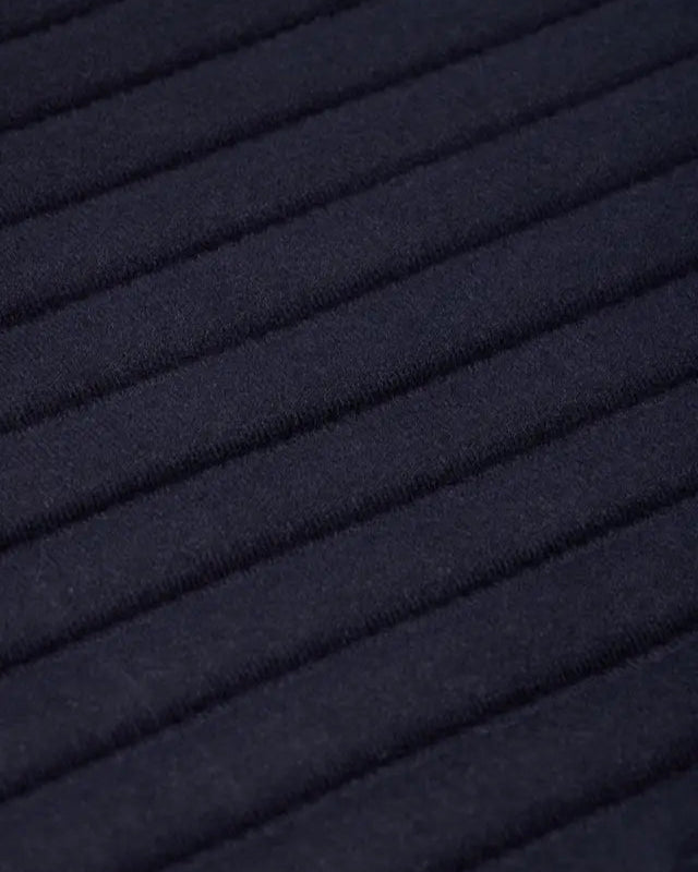 LeMieux Memory Foam Bandage Pads - Navy: Close-up of quilted horse leg protection with memory foam support and soft towelling.