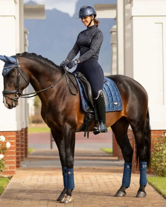 Woman on Horse with LeMieux Loire Classic Dressage Saddle Pad in Atlantic Blue - Equestrian Riding