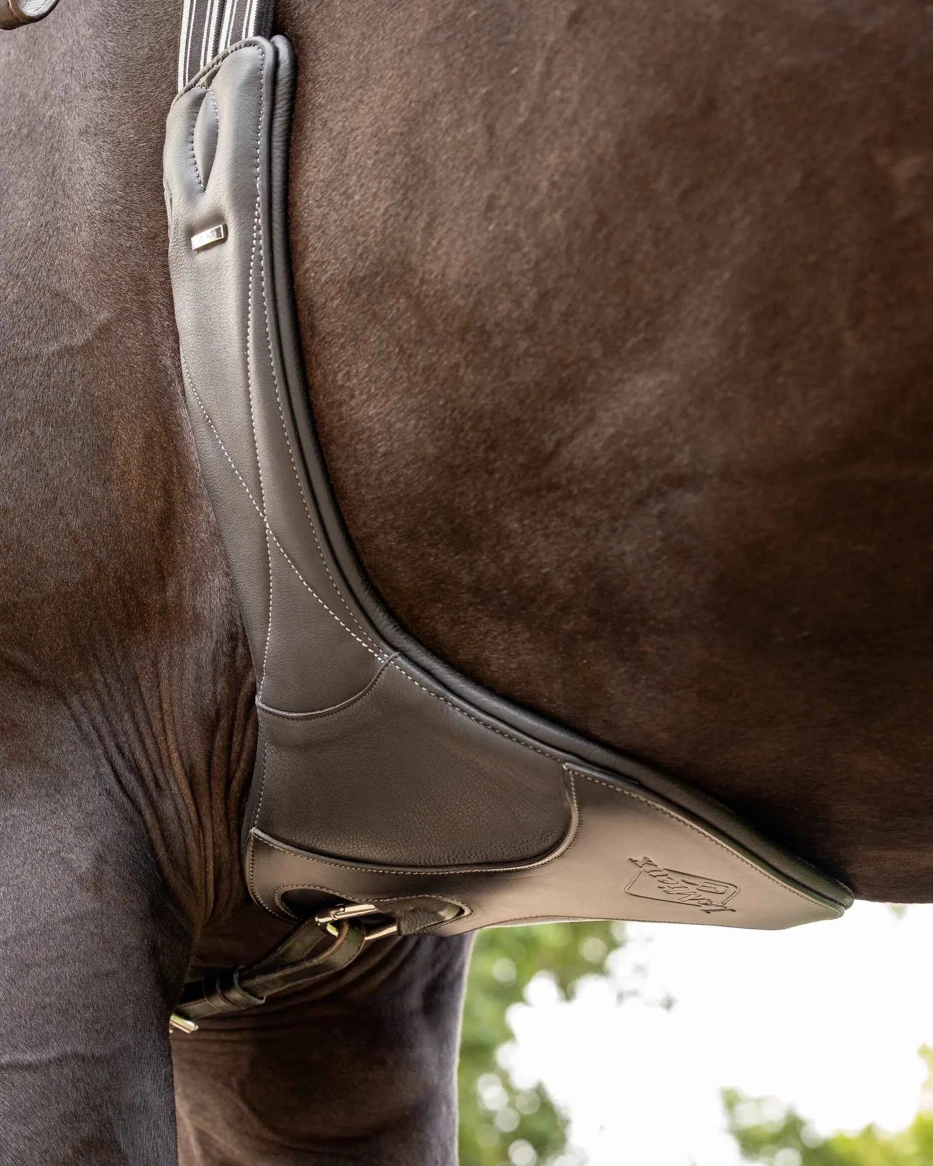 LeMieux Arika Contoured Long Stud Girth Brown