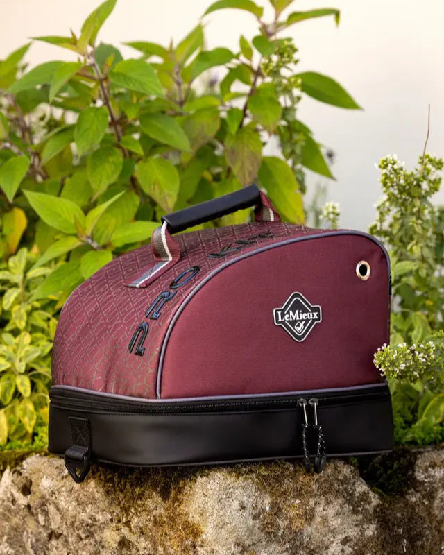 LeMieux Pro Hat Box Burgundy: Waterproof equestrian hat storage by Equiflair. Protect your riding hat in style.