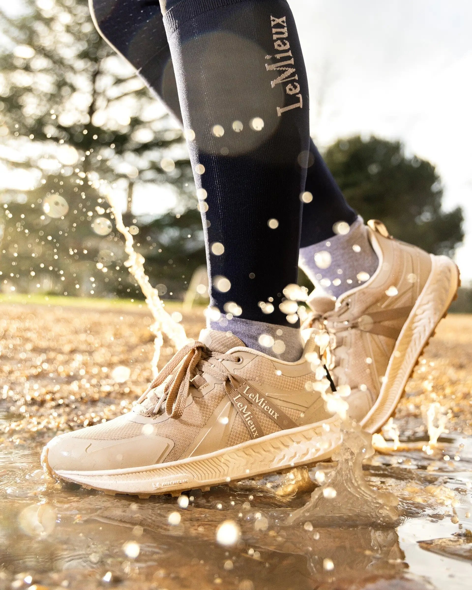 LeMieux Trax Waterproof Trainer Stone: Equestrian all-terrain footwear for comfort and style.