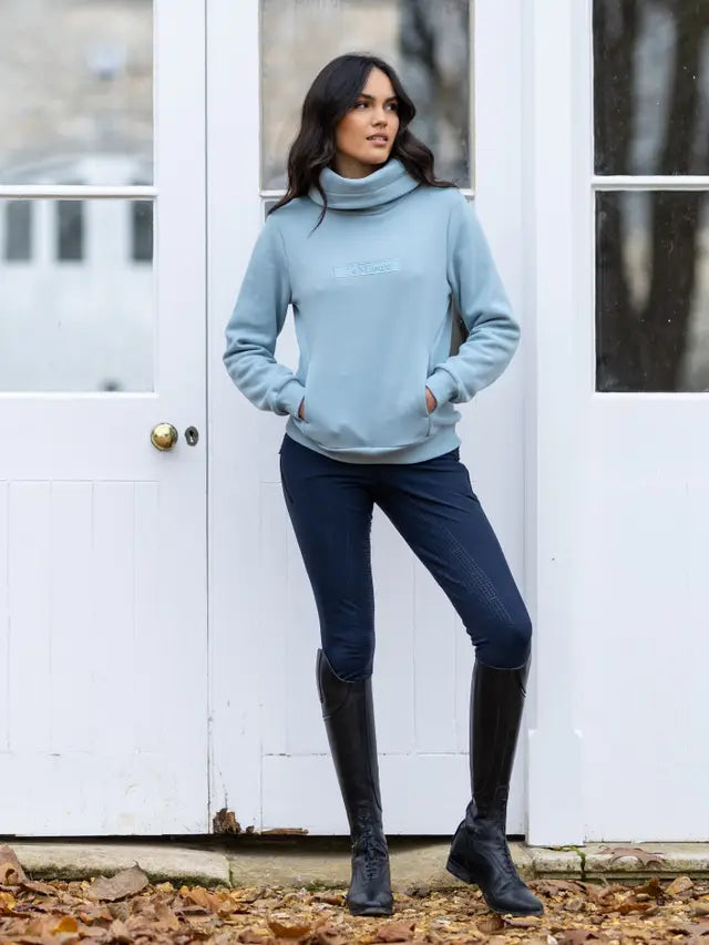 LEMIEUX ADELE FUNNEL NECK SWEAT GLACIER: Stylish blue funnel neck sweatshirt by Equiflair for women. Comfortable and ideal for layering.