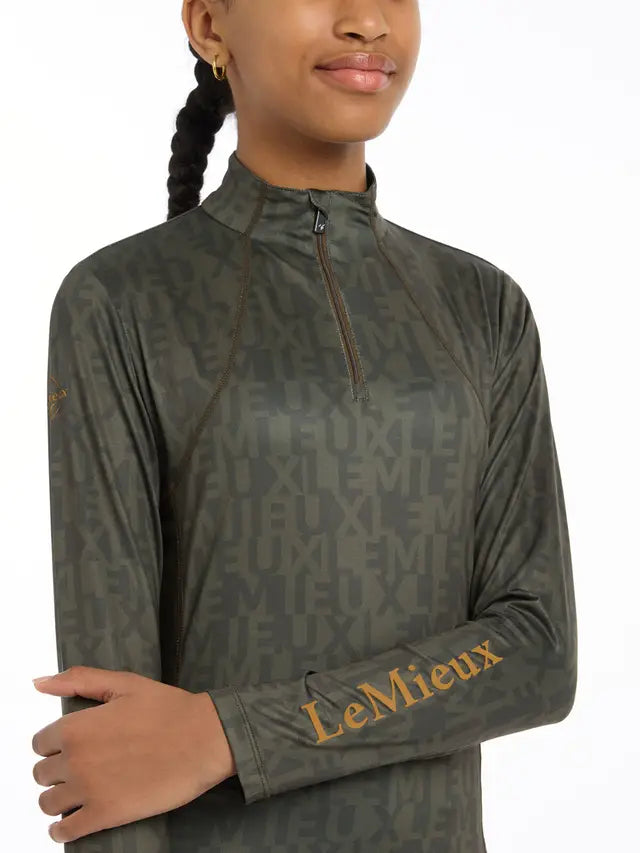 LeMieux Young Rider Casey Base Layer Alpine: Quarter Zip, UV30+, Active, Performance Base Layer - Buy now from Equiflair!