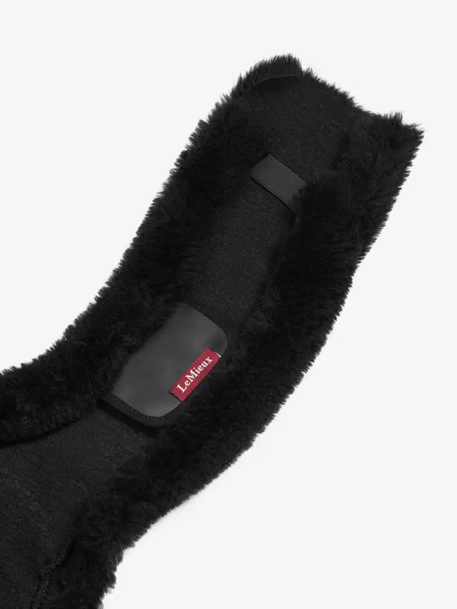 LeMieux Merino+ Jumping Girth Cover - Black: Anatomical horse girth cover for comfort and protection.