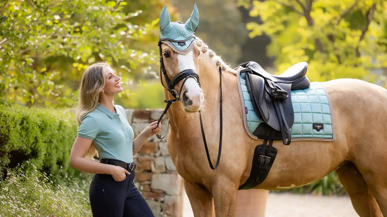 LeMieux Loire Classic Dressage Saddle Pad in Aqua on a Horse with Rider | Equestrian Apparel