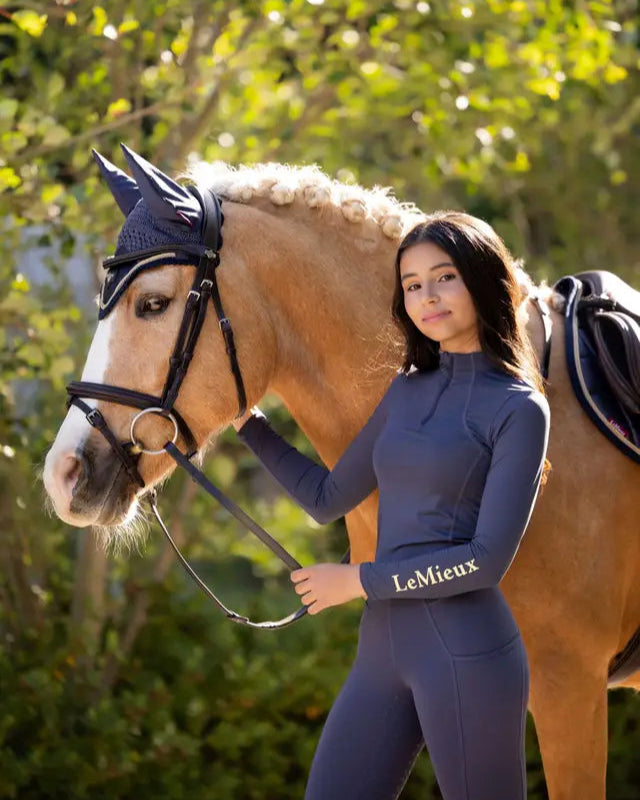 LeMieux Young Rider Base Layer Dusk Blue: Equestrian Apparel for Young Riders with UV50+ Protection.