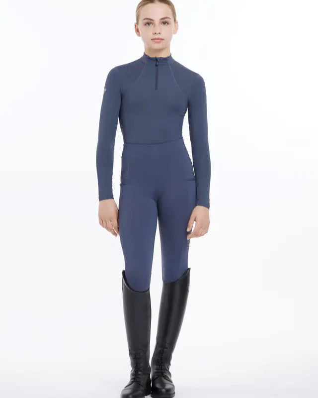 LeMieux Young Rider Base Layer Dusk Blue: Equestrian apparel, long sleeve top, riding gear, horseback riding clothes, riding boots.