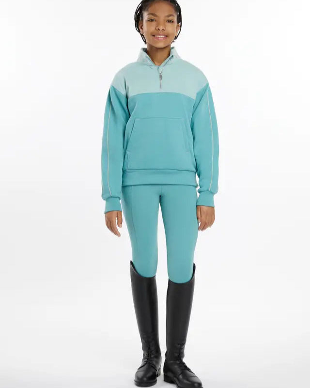 LEMIEUX Young Rider Kate Quarter Zip Sweat Lagoon, Leggings & Riding Boots - Equiflair | Girl in equestrian apparel