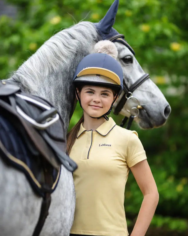 Young Equestrian Rider in LeMieux Polo Shirt with Horse - Equiflair