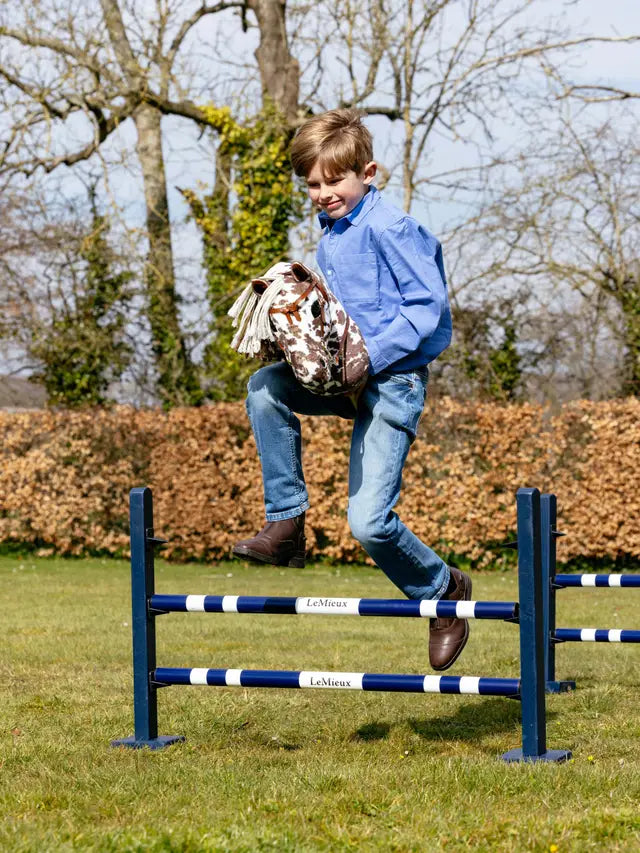 Boy Jumping Lemieux Obstacle on LEMIEUX HOBBY HORSE MONTANA Toy Horse. Equiflair Store