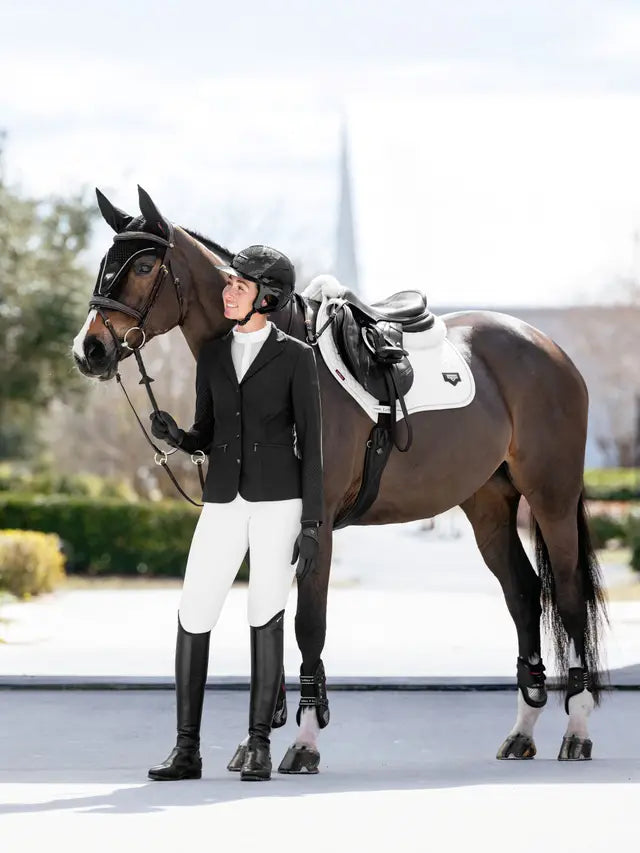 LeMieux Puissance Suede Close Contact Saddle Pad in White. Equestrian product by Equiflair. Stylish Horse Riding Equipment.