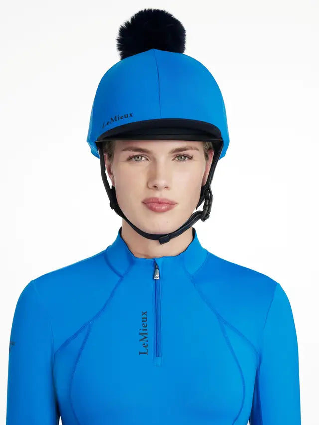 LeMieux Classique Benetton Blue Riding Hat with Pom Pom - Stylish equestrian helmet accessory