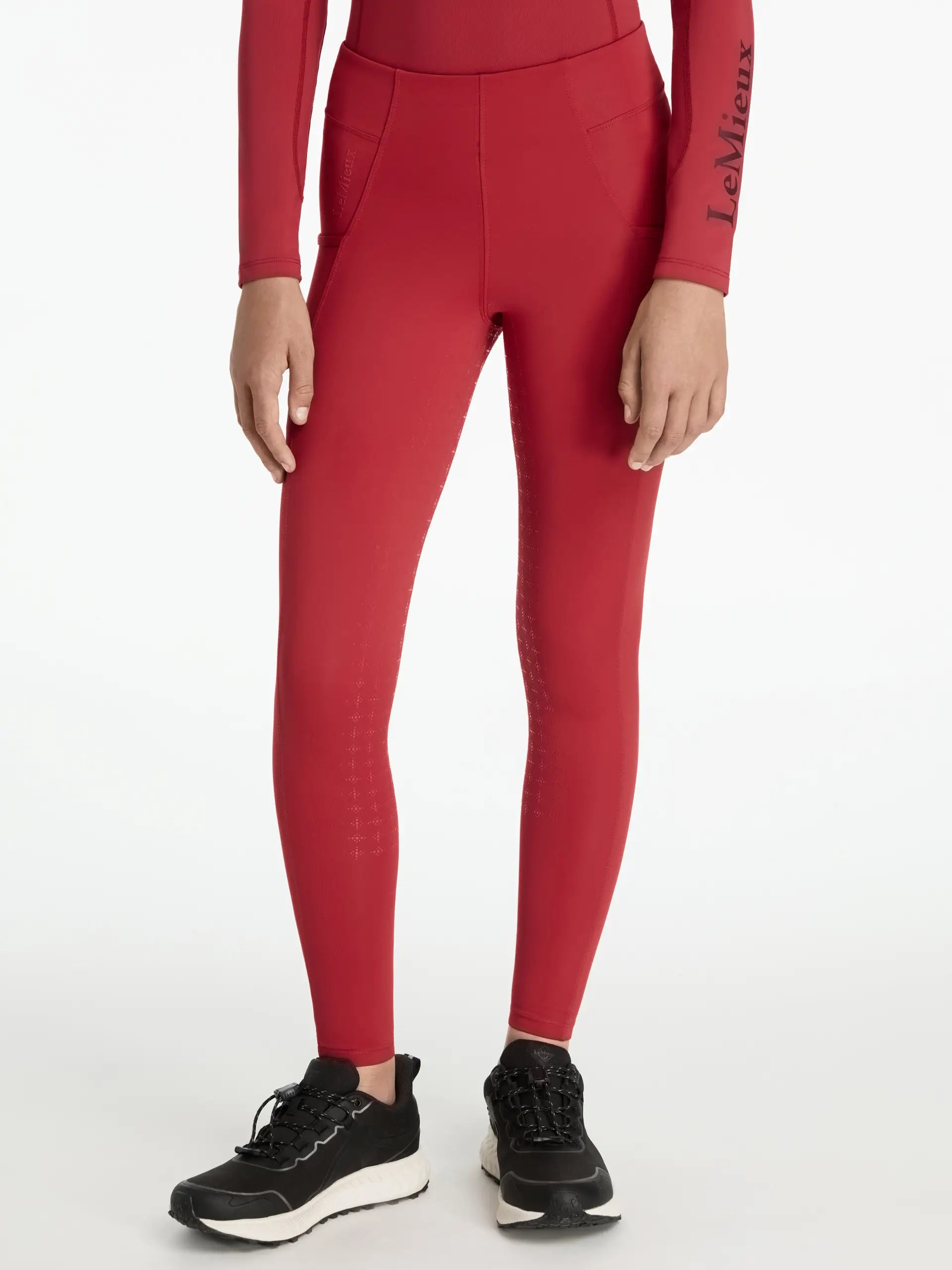 LEMIEUX Young Rider Orla Pull Ons in Chili: Equestrian riding leggings with full seat grip & leg pockets for horse riding comfort.