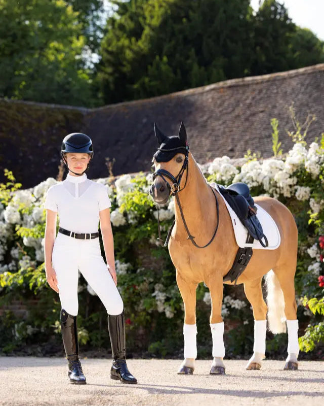 Young Equestrian Rider with Horse wearing LEMIEUX White Show Shirt at Equiflair Saddlery