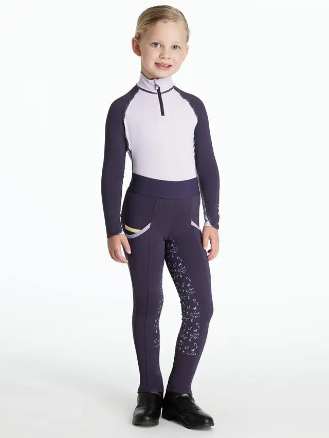 Girl in LeMieux Mini Pull On Juniper Breeches - Equestrian Riding Apparel for Children - Shop Equiflair