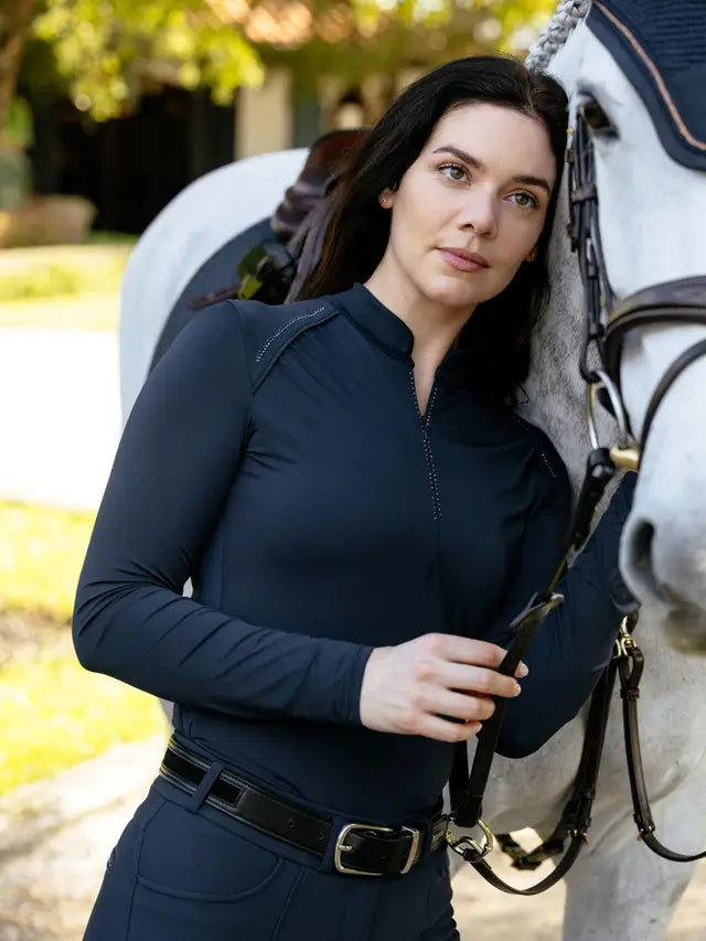 LeMieux Brilliance Navy Lightweight Base Layer on woman with horse | Equestrian Performance Top