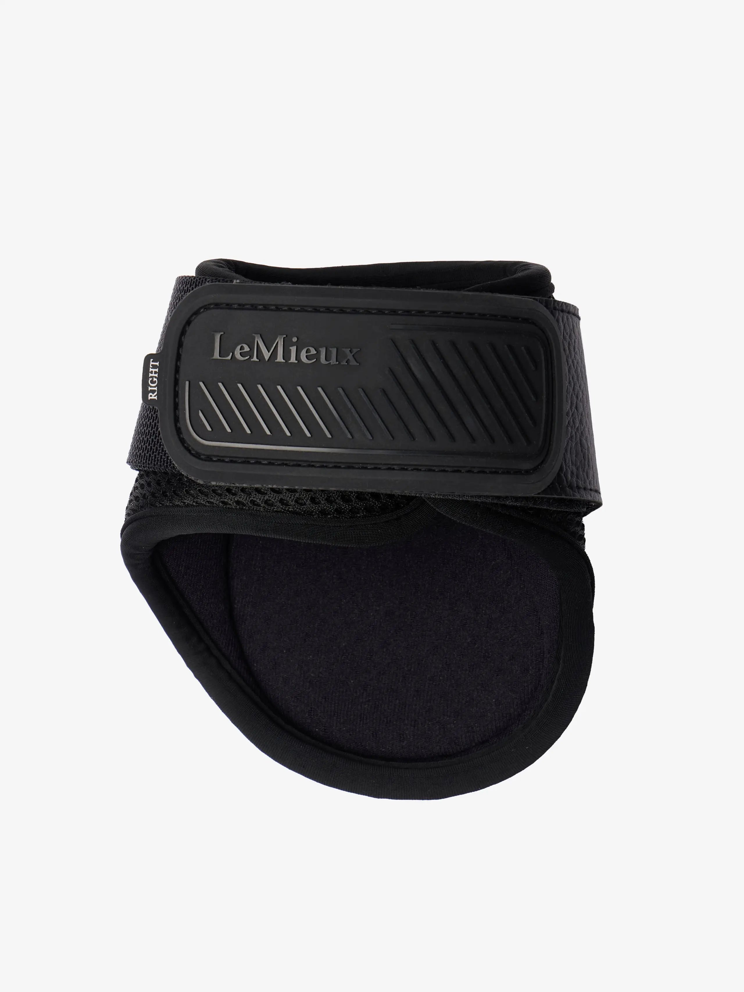 LeMieux black compliant fetlock boots for horses - durable, protective, and cooling.