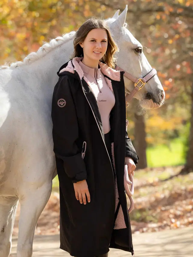 LeMieux Young Rider HydroSheild Robe Black: Girl with horse, waterproof, full-length, fleece-lined riding coat.