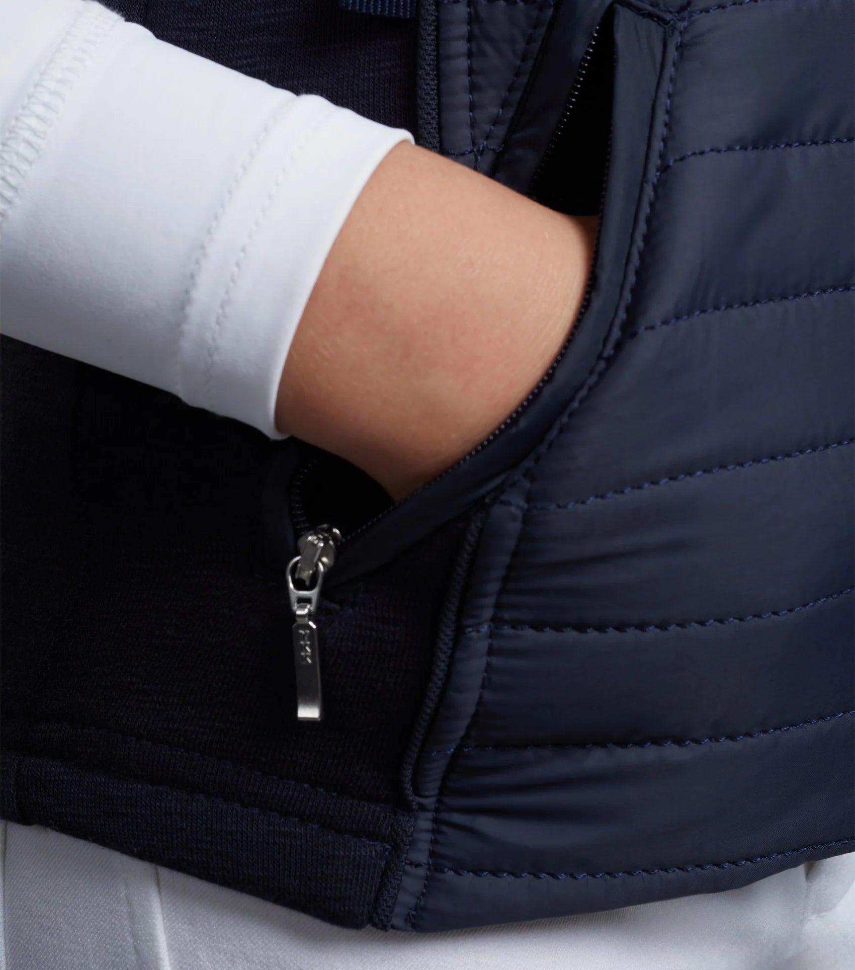 Girl's Navy Hybrid Riding Gilet Premier Equine - Hand in Zippered Pocket