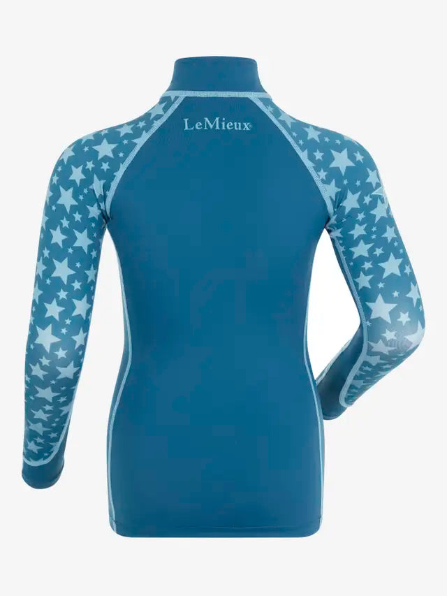 LeMieux Mini Base Layer Marine: Blue riding top with star patterned sleeves. Equiflair store image.