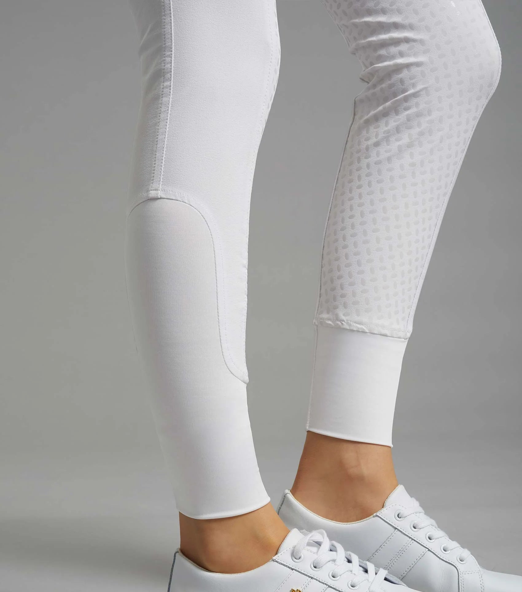 Premier Equine Milliania white competition breeches with full seat gel. Equestrian apparel from Equiflair.