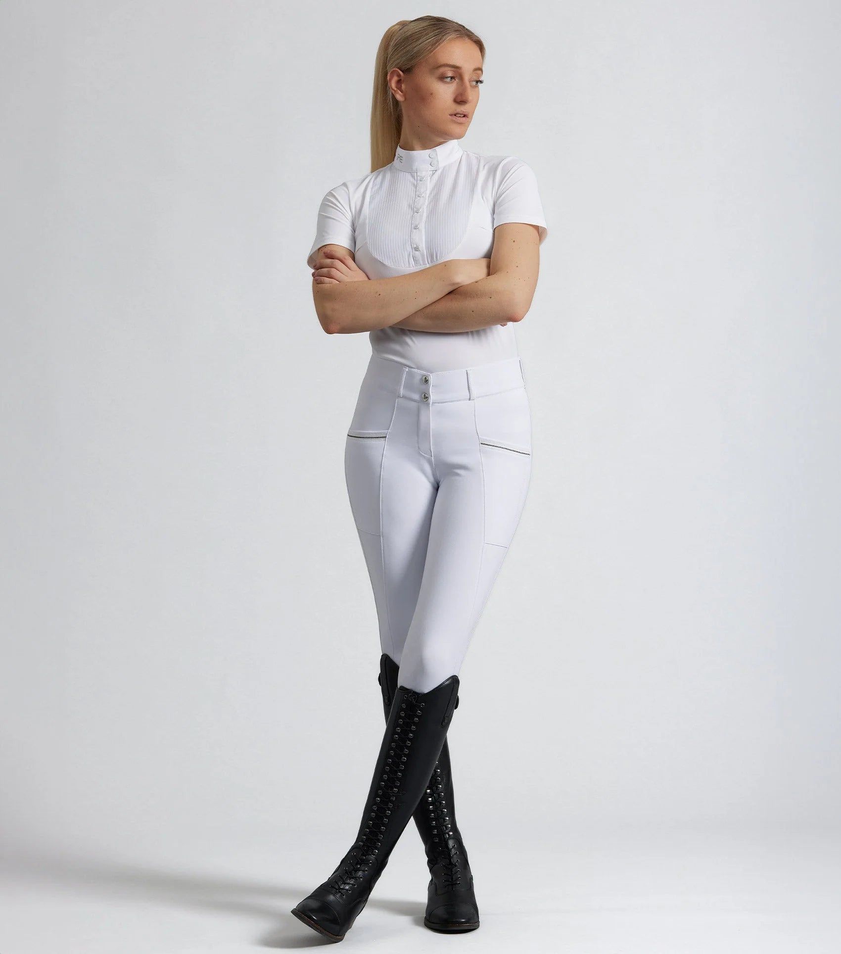 Premier Equine Ofena White Competition Riding Breeches for Women with Gel Knee Patches & Stylish Phone Pockets.