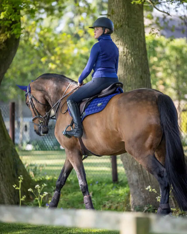 LeMieux Loire Classic Saddle Pad Ink Blue on Horse & Rider. Stylish equestrian gear from Equiflair.