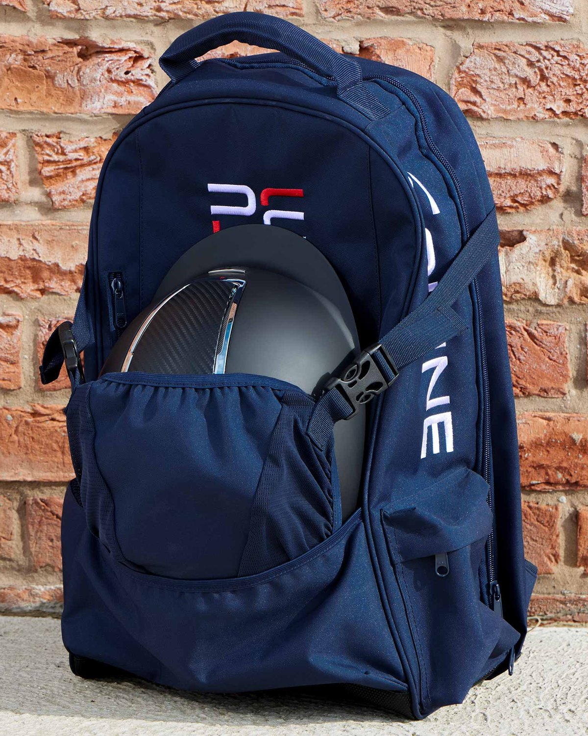 Premier Equine Navy Rucksack: Equestrian Team Backpack with Helmet Storage - Buy Online