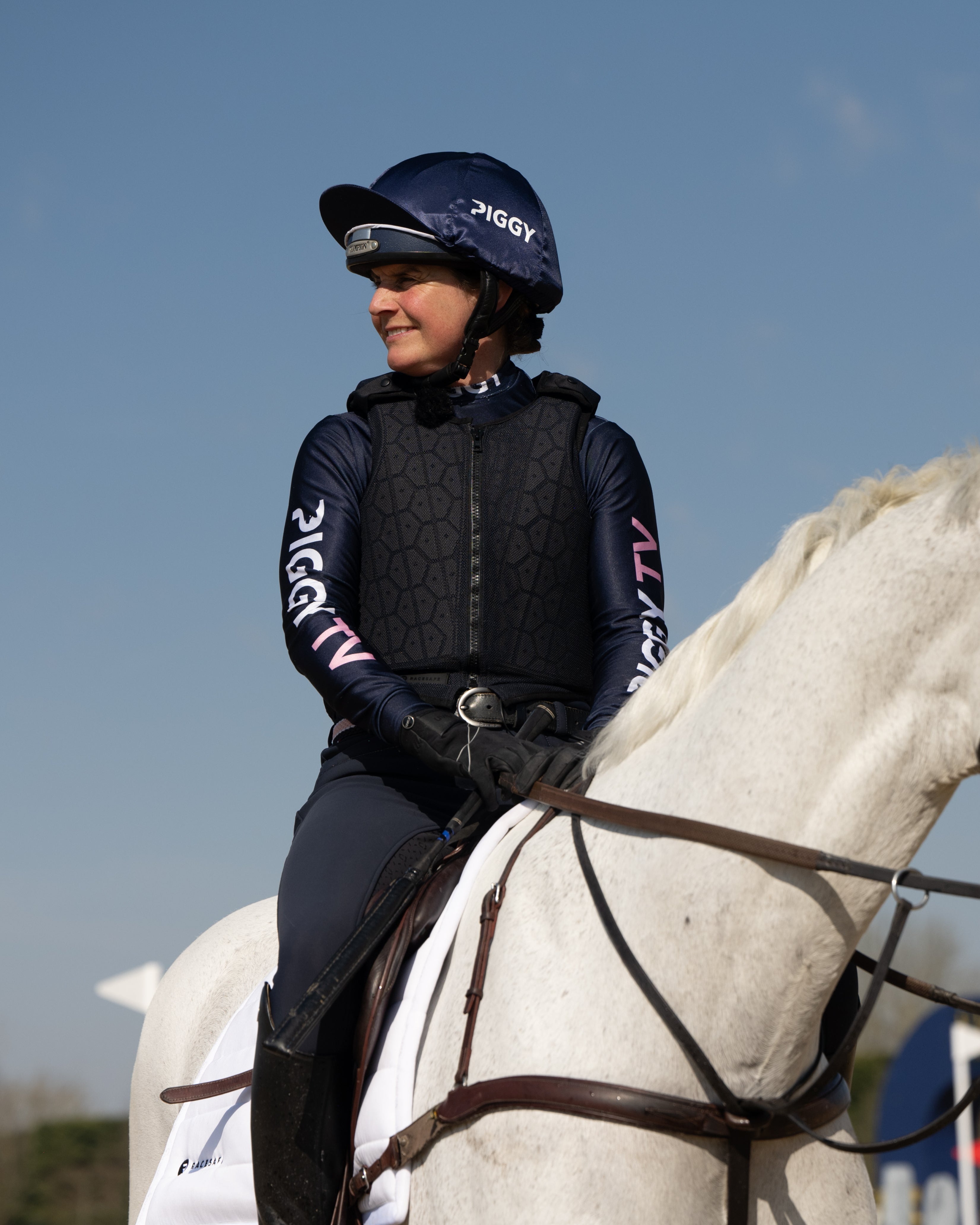 RACESAFE HX3 Body Protector Black worn by equestrian rider during horseback riding. Level 3 safety.