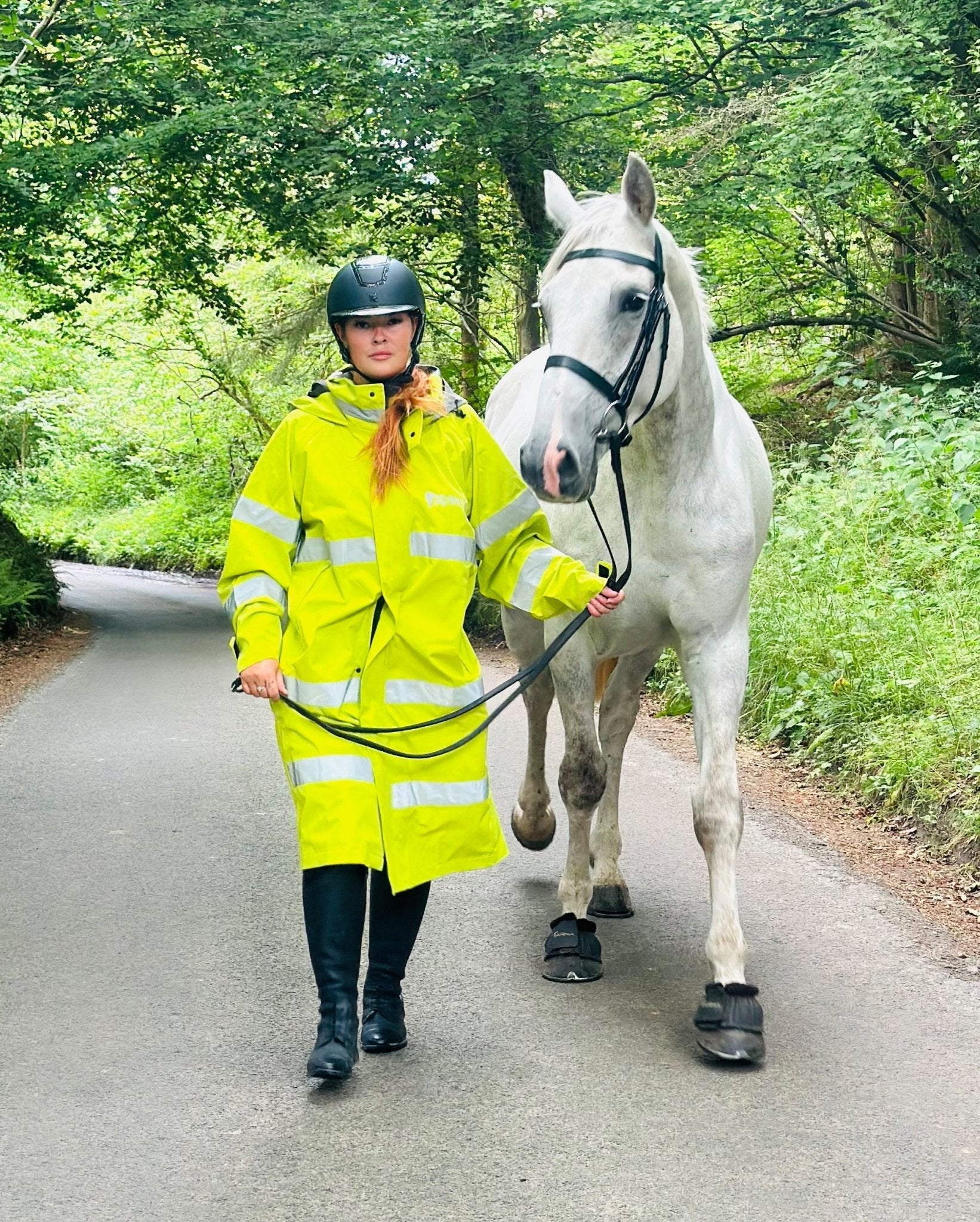Equiflair: Hi-Vis Yellow Reincoat for Horse Riding - Woman with Horse