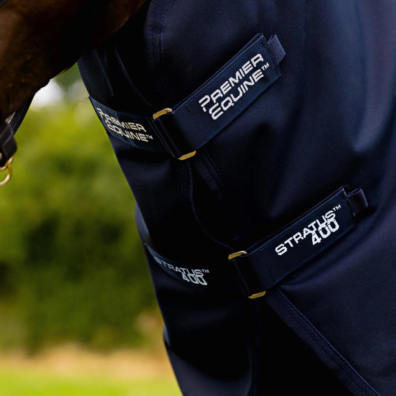 Premier Equine Stratus 400g Turnout Rug with Neck Cover - Navy. Weatherproof horse blanket with durable design.