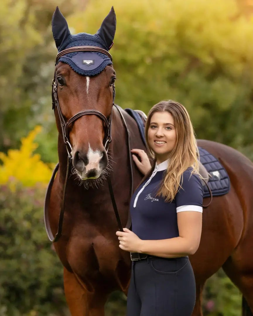 LeMieux Loire Fly Hood Navy on Horse with Equestrian Woman - Horse Ear Net Fly Protection