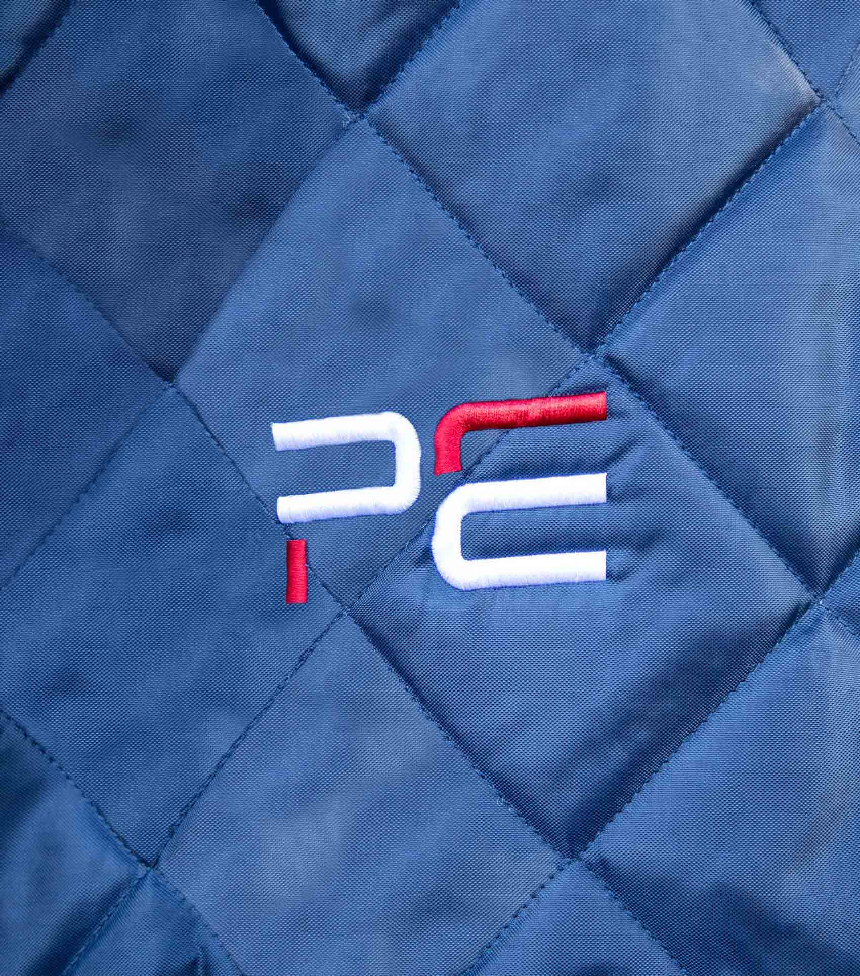 Premier Equine Tuscan Stable Rug Detail - Quilted Navy Fabric with Brand Logo