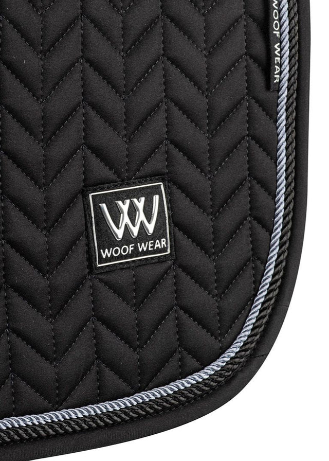 Woof Wear Herringbone Close Contact Saddle Pad - Black. Quilted horse riding saddle pad with silver logo and rope trim.