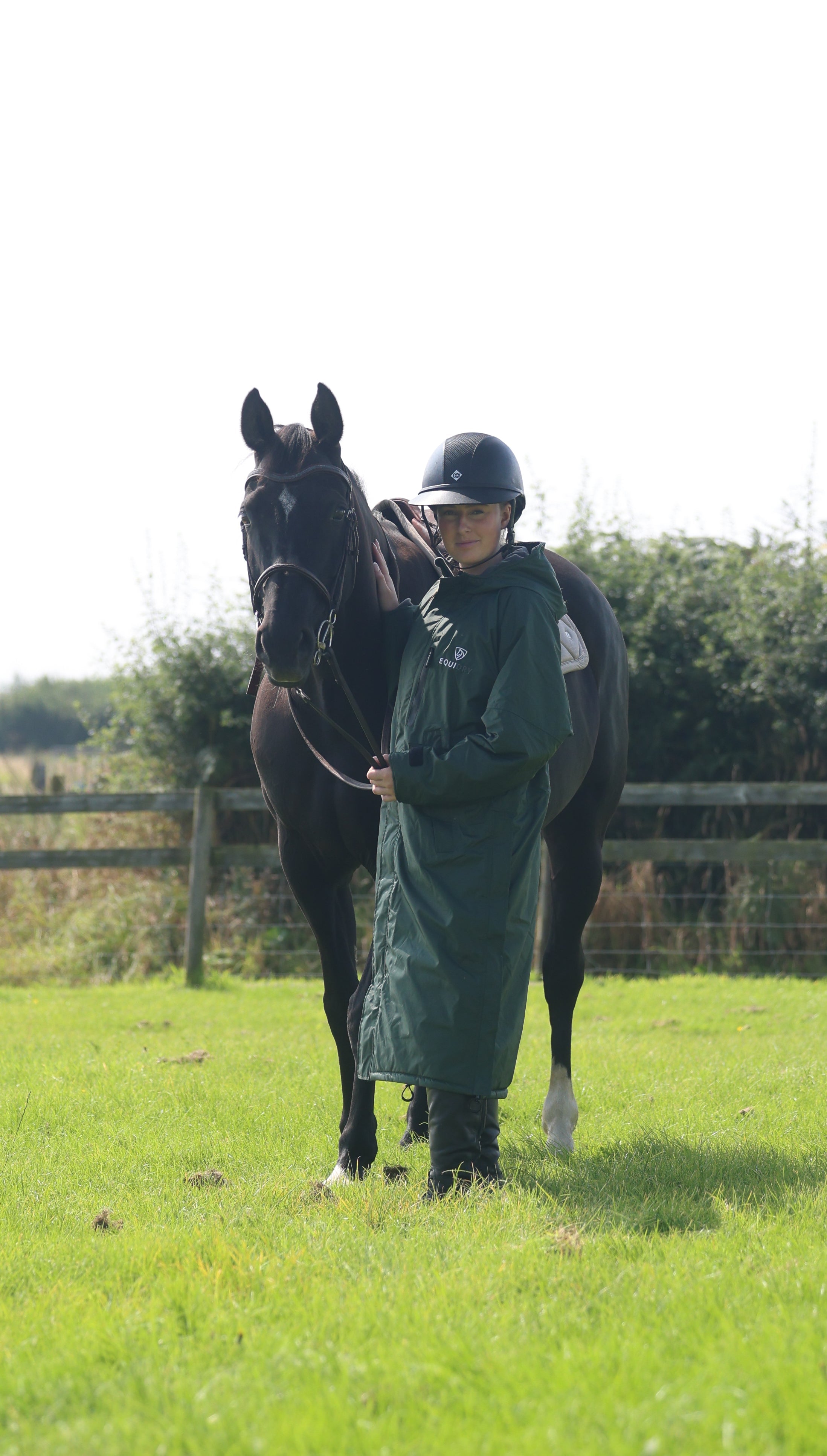 EQUIDRY women's thin fleece long waterproof horse riding coat in black forest green with horse